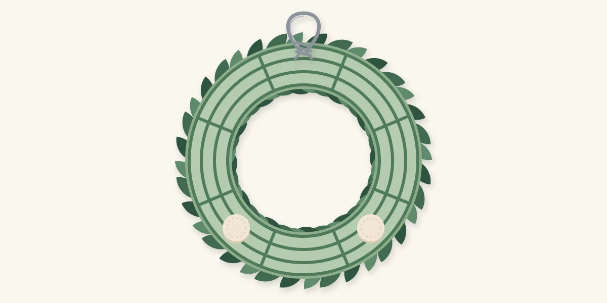 Back of a wreath with a wire hanging loop at the top and two felt pads near the bottom